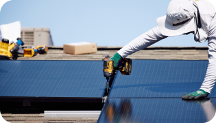 Professional installing solar panels